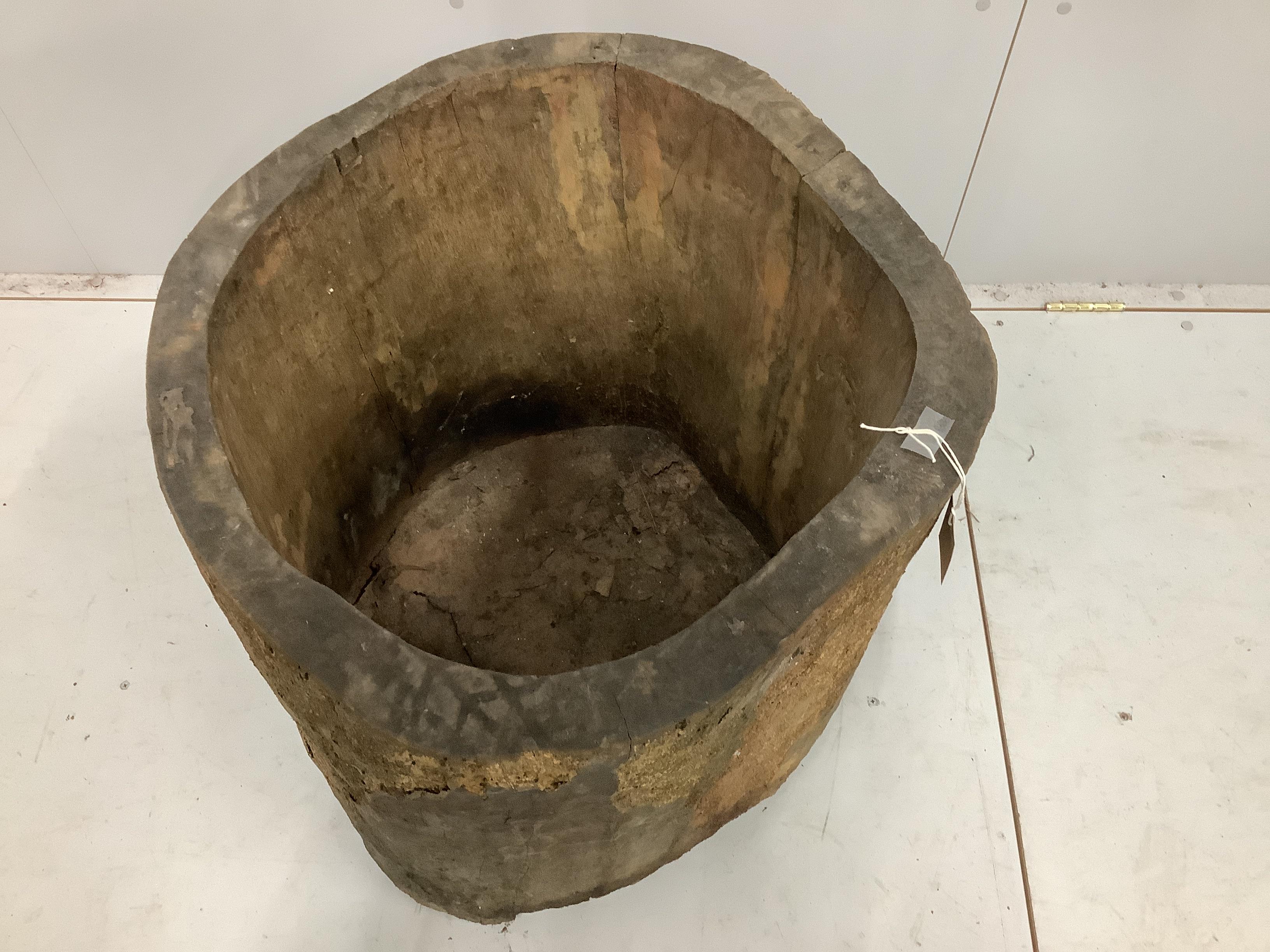 A Provincial circular wooden mortar, diameter 50cm, height 71cm